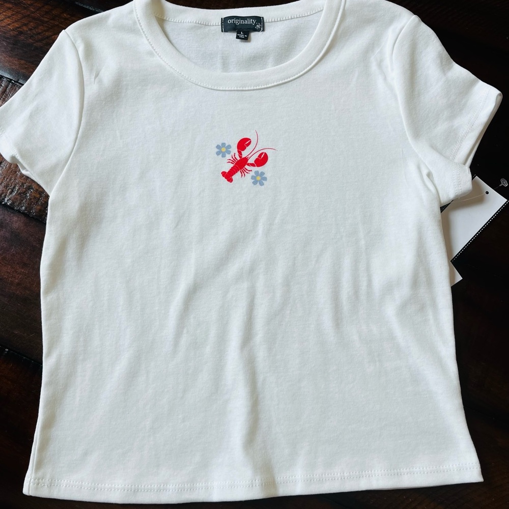 Originalilty Junior girls  T-shirt, size large